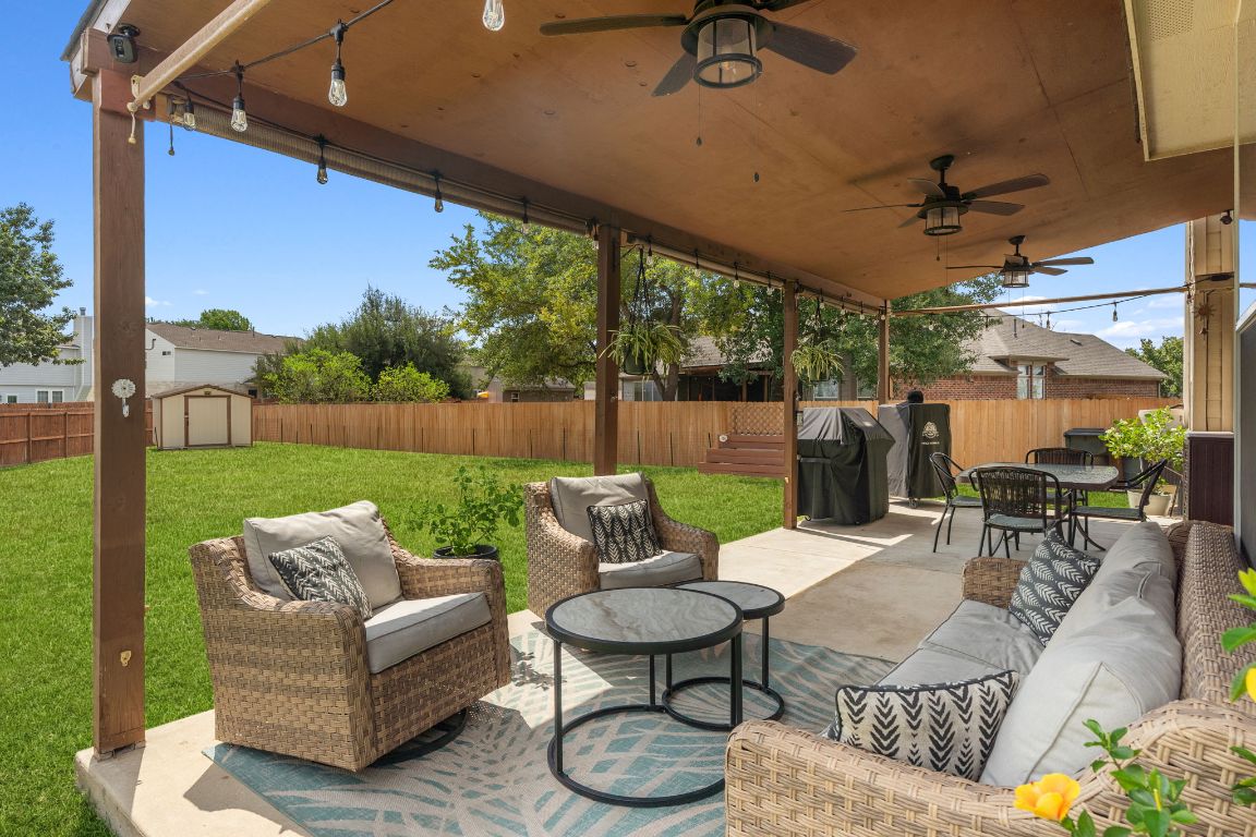 154 Larch Cove Kyle, TX 78640 - Photo 24 of 25 a view of a patio with couches and a table