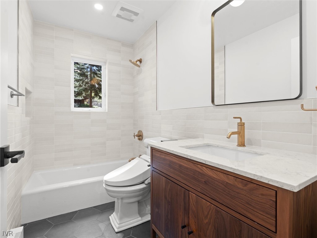 1106 Altdorf Terrace Incline Village, NV 89451 - Photo 19 of 50 a bathroom with a sink a toilet and a bathtub
