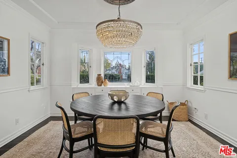 a kitchen with stainless steel appliances granite countertop a stove a sink and a granite counter tops