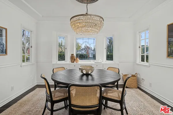 a kitchen with stainless steel appliances granite countertop a stove a sink and a granite counter tops