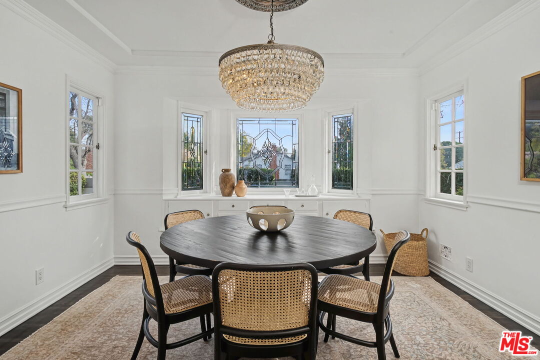 5009 Willowcrest Avenue North Hollywood, CA 91601 - Photo 11 of 61 a view of a dining room with furniture and window