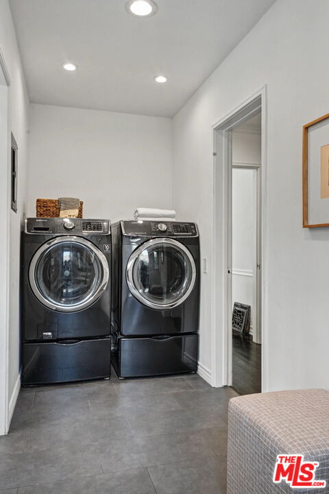 5009 Willowcrest Avenue North Hollywood, CA 91601 - Photo 23 of 61 a utility room with a washer and dryer