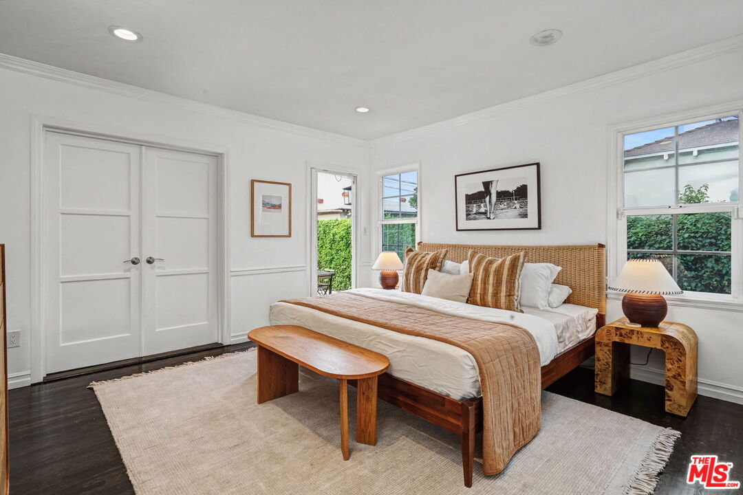 5009 Willowcrest Avenue North Hollywood, CA 91601 - Photo 26 of 61 a bedroom with a bed and window