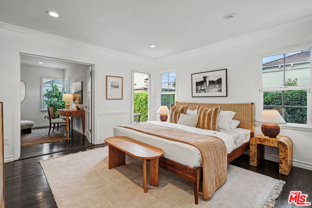 5009 Willowcrest Avenue North Hollywood, CA 91601 - Photo 27 of 61 a bedroom with a bed and a couch