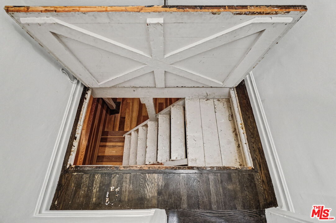 5009 Willowcrest Avenue North Hollywood, CA 91601 - Photo 34 of 61 a view of staircase with railing and white walls
