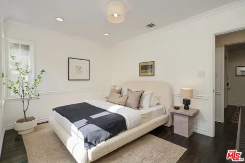 a house view with a garden space