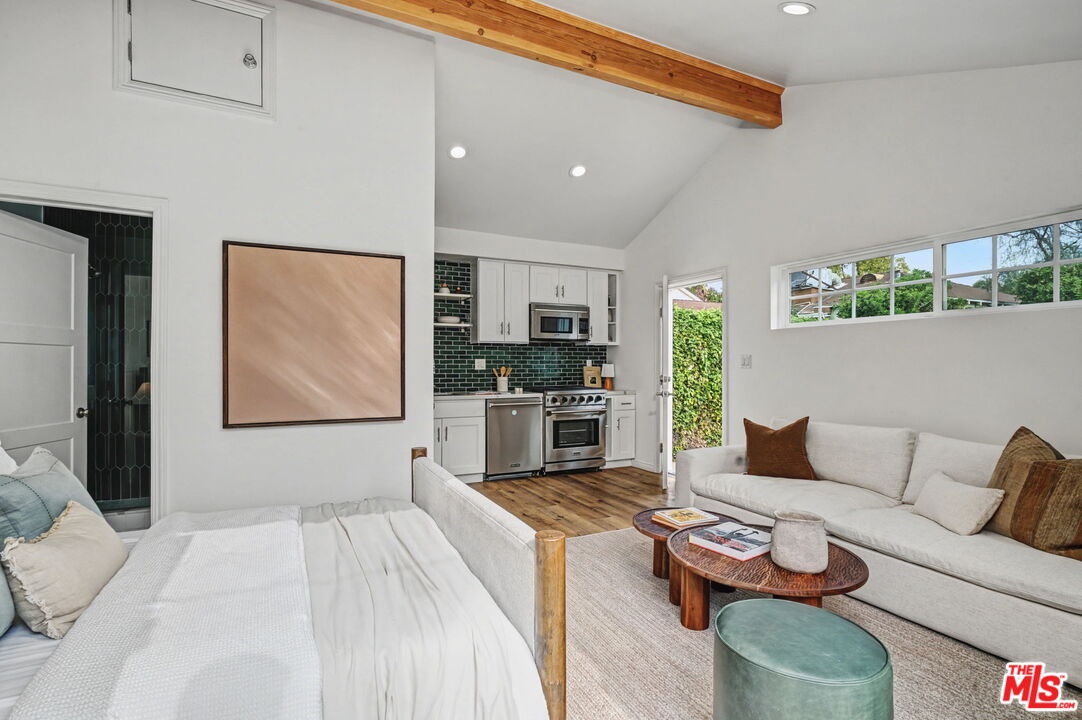 5009 Willowcrest Avenue North Hollywood, CA 91601 - Photo 51 of 61 a living room with furniture and a fireplace