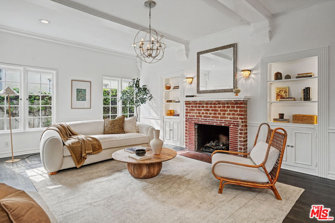 5009 Willowcrest Avenue North Hollywood, CA 91601 - Photo 7 of 61 a living room with furniture fireplace and window