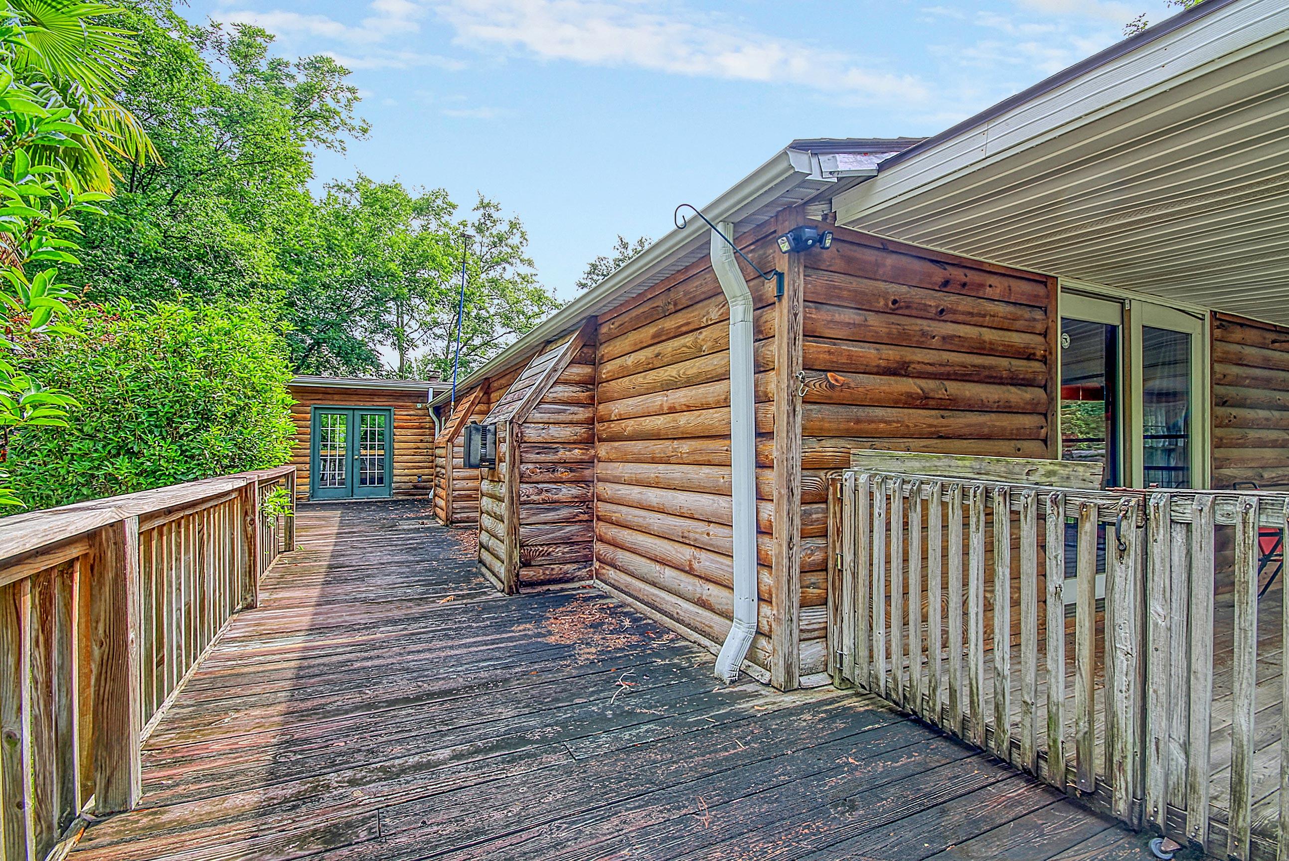 1386 State Rd S-8-449 Summerville, SC 29486 - Photo 6 of 32 Porch_Wraps_to_Backyard