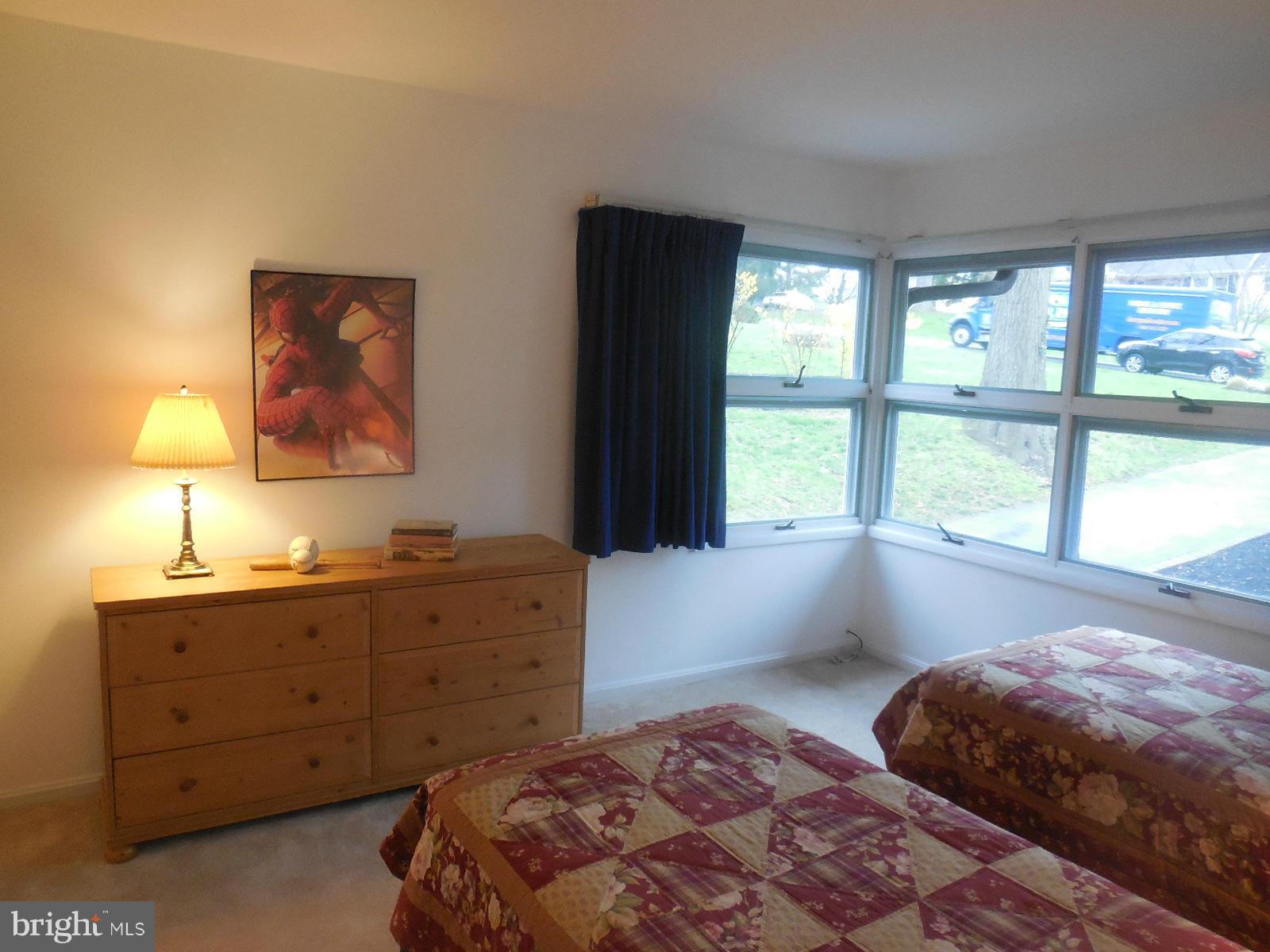 1908 Norvale Road Silver Spring, MD 20906 - Photo 12 of 30 a bedroom with a bed and a window