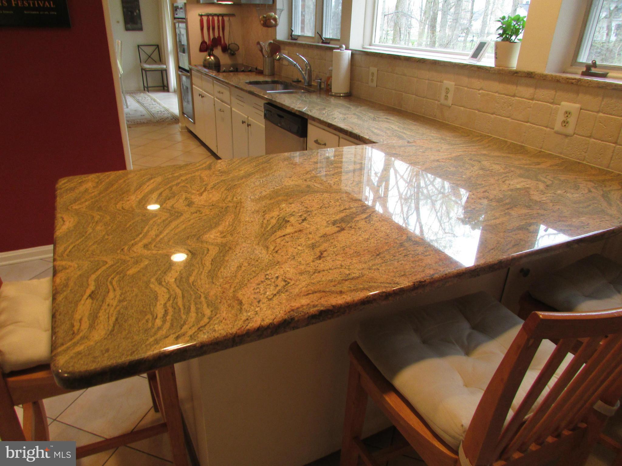 1908 Norvale Road Silver Spring, MD 20906 - Photo 22 of 30 a kitchen with a sink and a stove top oven