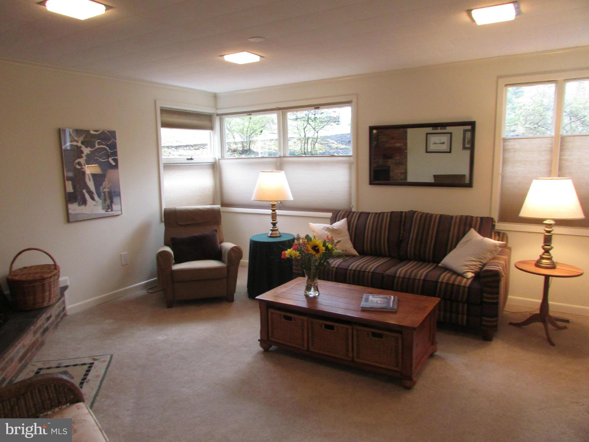 1908 Norvale Road Silver Spring, MD 20906 - Photo 25 of 30 a living room with furniture and a large window