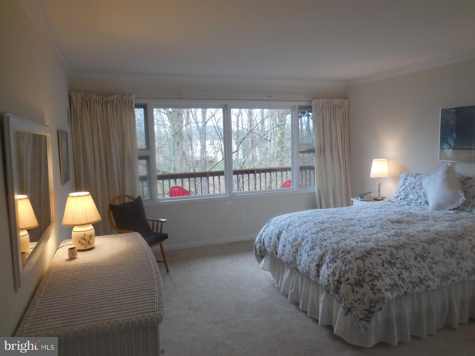 1908 Norvale Road Silver Spring, MD 20906 - Photo 6 of 30 a bedroom with a bed and a window