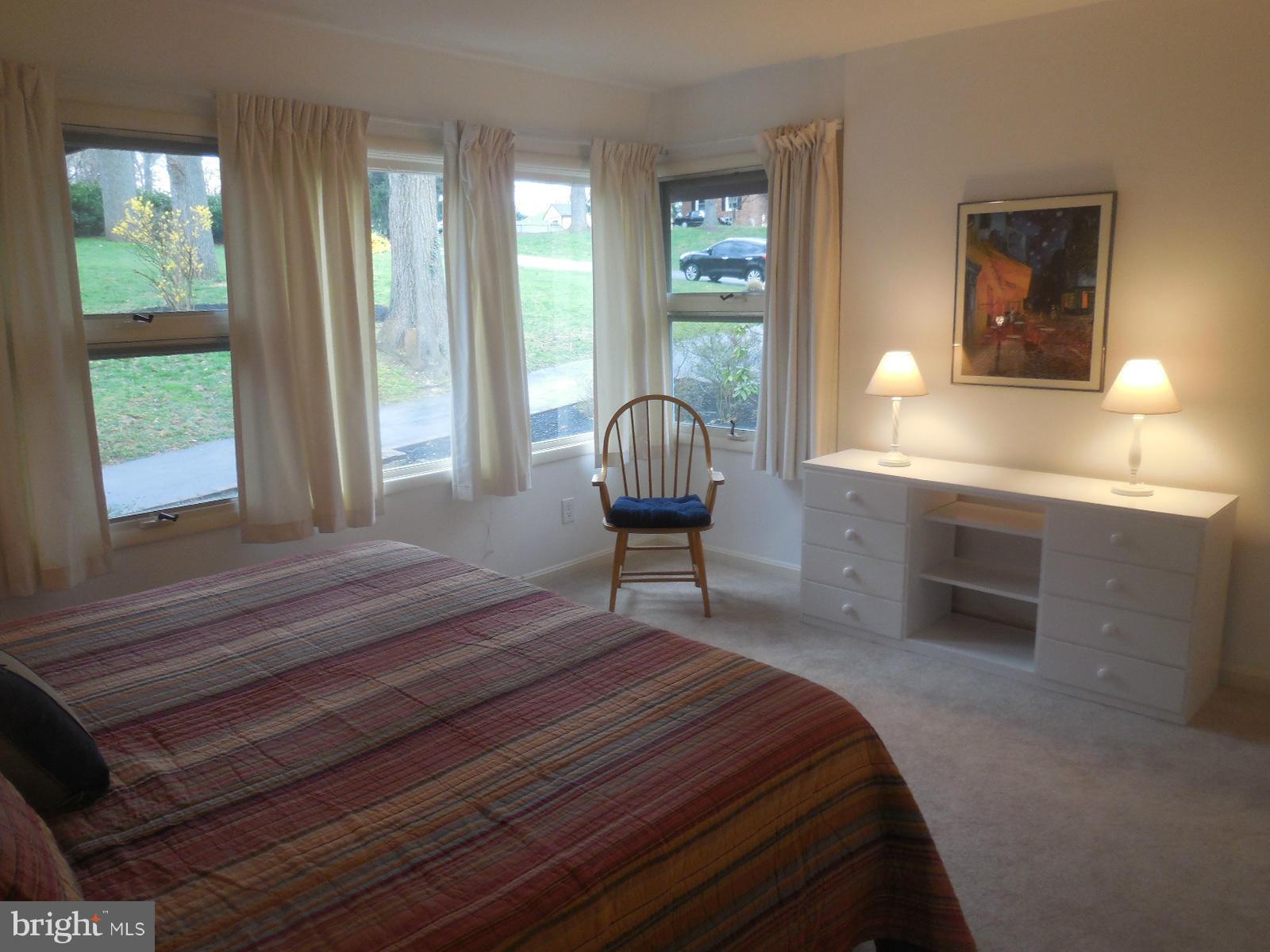 1908 Norvale Road Silver Spring, MD 20906 - Photo 10 of 30 a bedroom with a bed and a window