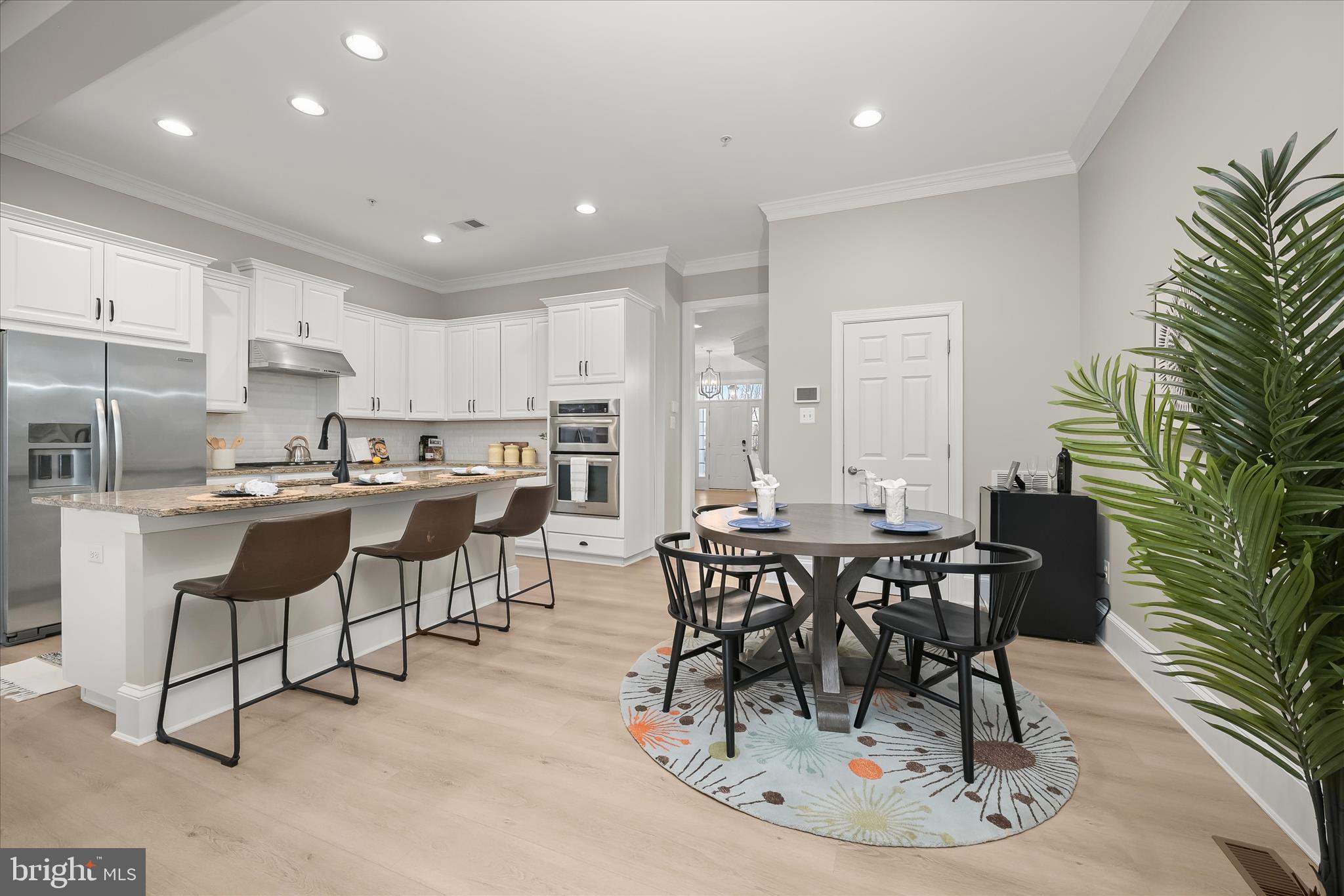 7905 Maple Lawn Boulevard Fulton, MD 20723 - Photo 14 of 49 a view of a dining room with furniture