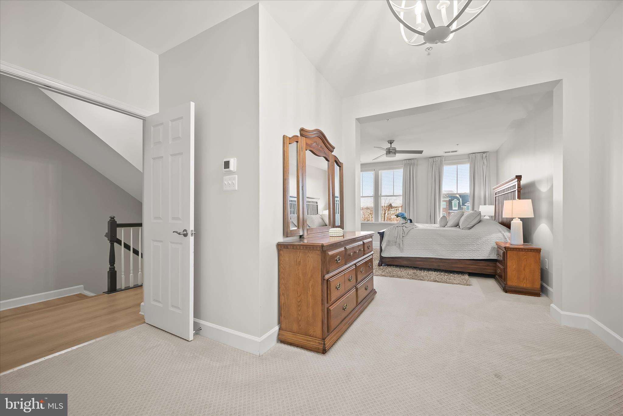 7905 Maple Lawn Boulevard Fulton, MD 20723 - Photo 20 of 49 a large bedroom with a large bed and furniture