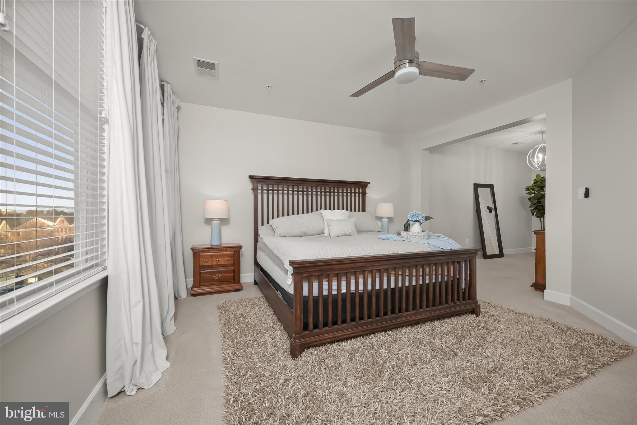7905 Maple Lawn Boulevard Fulton, MD 20723 - Photo 22 of 49 a bedroom with bed and a window