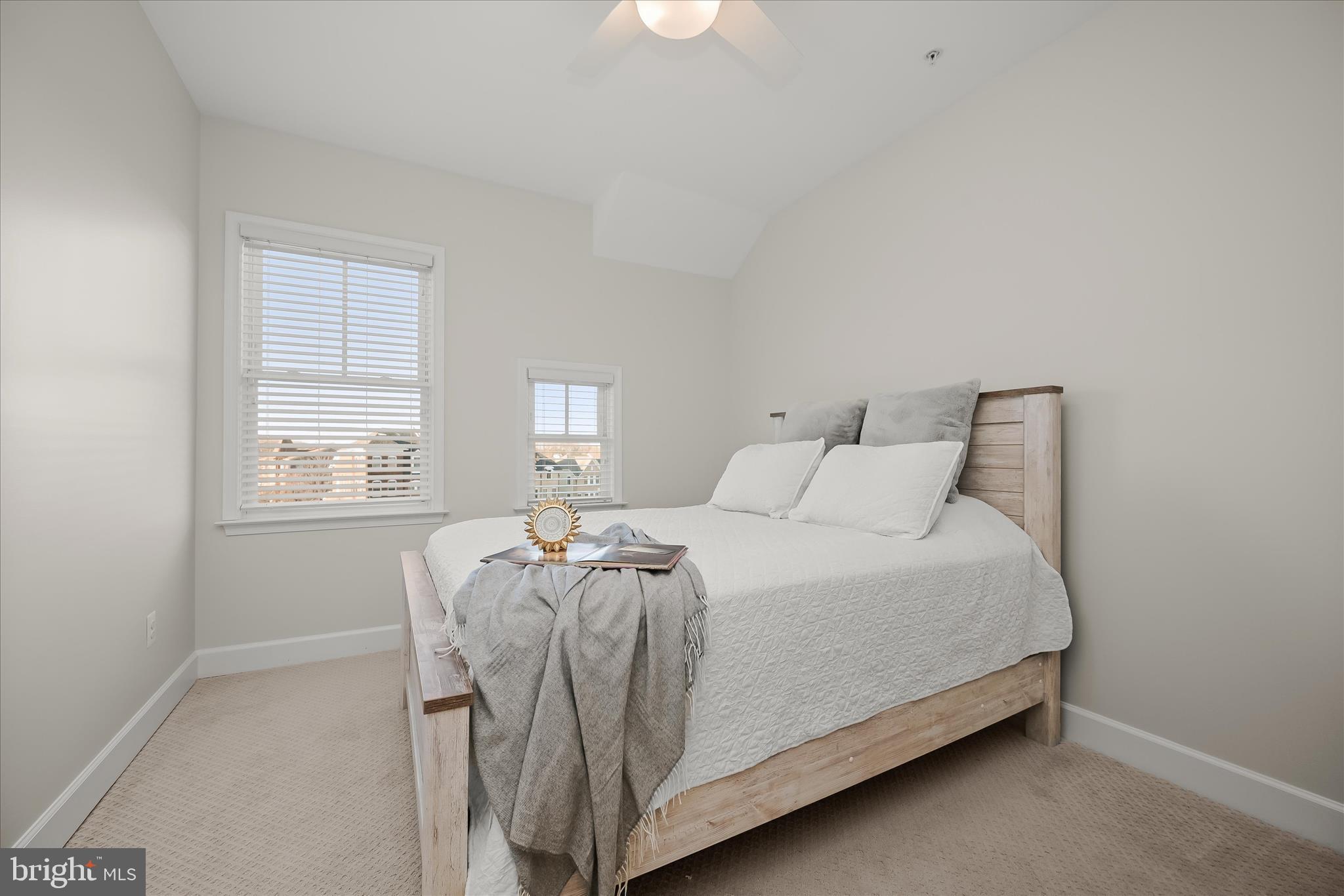 7905 Maple Lawn Boulevard Fulton, MD 20723 - Photo 28 of 49 a bed sitting in a bedroom next to a window