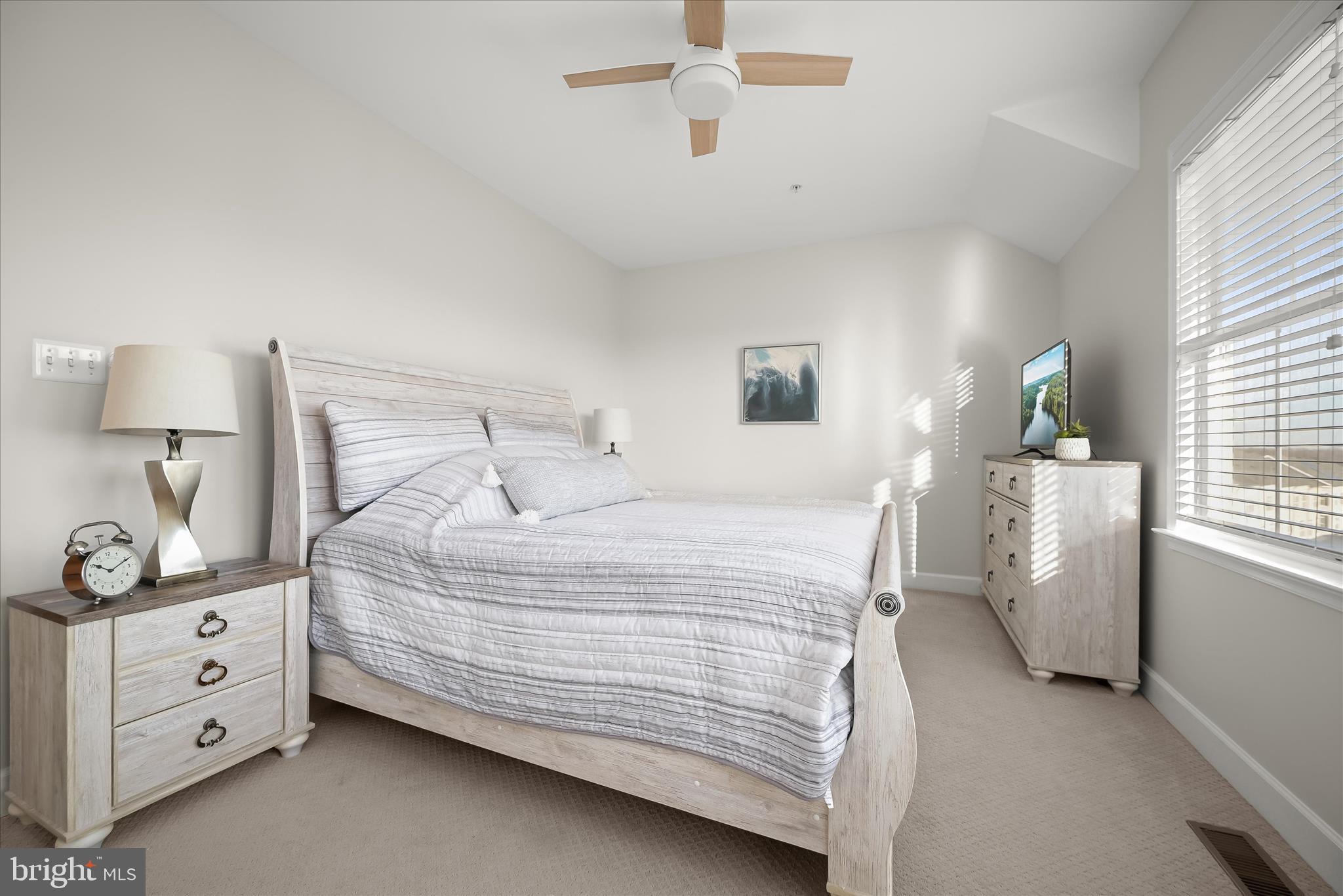 7905 Maple Lawn Boulevard Fulton, MD 20723 - Photo 33 of 49 a bedroom with a bed and a cabinets