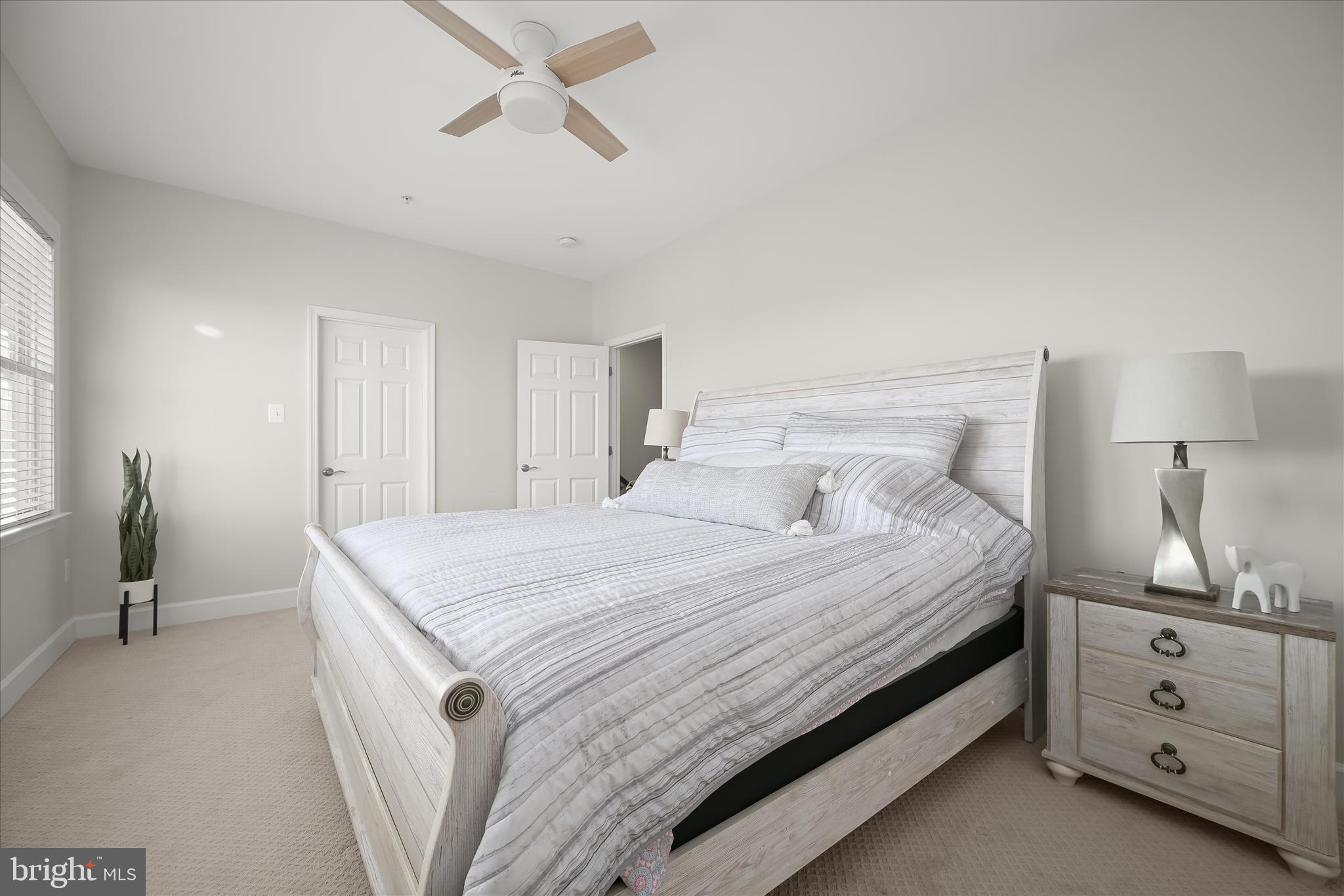 7905 Maple Lawn Boulevard Fulton, MD 20723 - Photo 34 of 49 a bedroom with a bed and a night stand