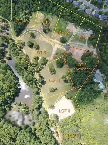 a bathroom with a tub and trees in the background