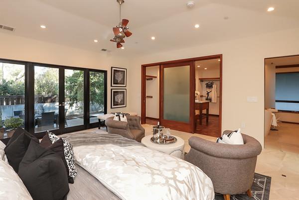 14480 Oak Place Saratoga, CA 95070 - Photo 21 of 50 a living room with furniture and large windows