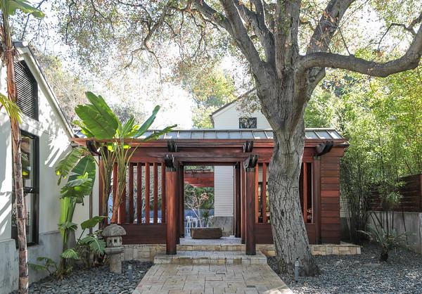 14480 Oak Place Saratoga, CA 95070 - Photo 3 of 50 a front view of a house with a tree
