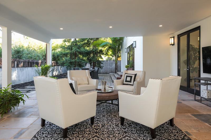 14480 Oak Place Saratoga, CA 95070 - Photo 32 of 50 a living room with patio furniture and a potted plant