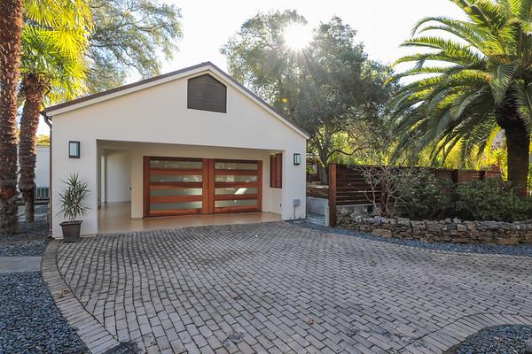 14480 Oak Place Saratoga, CA 95070 - Photo 48 of 50 a view of a house with a yard and potted plants