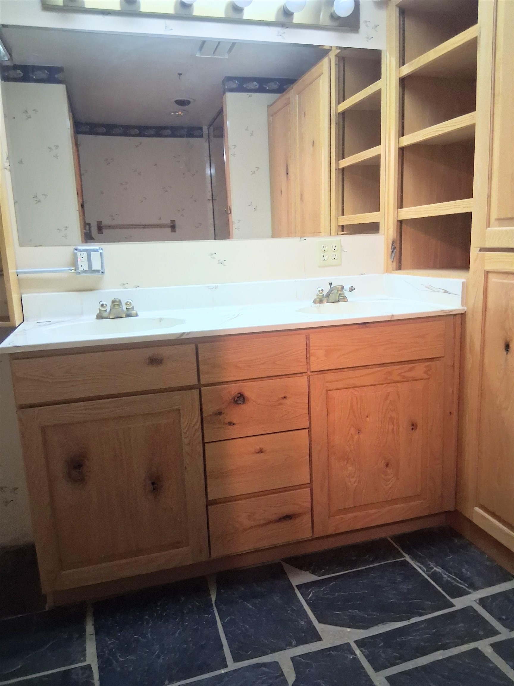 1983 River Road Fruita, CO 81521 - Photo 25 of 31 a room with washing machine cabinets and a sink