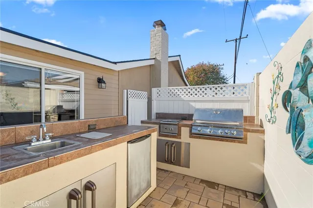 a kitchen with a stove and a sink