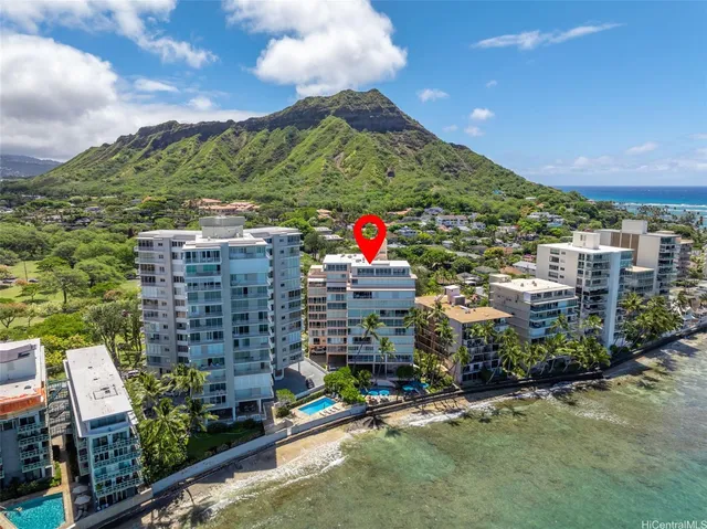 aerial view of a city with an ocean view