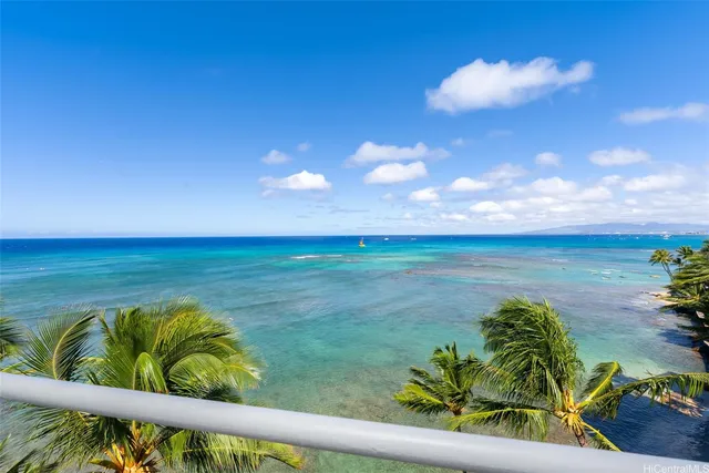 a bedroom with furniture and large windows