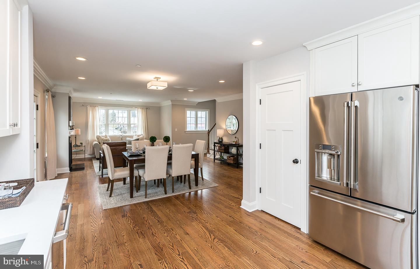 111 West Montgomery Avenue, Unit 107 Ardmore, PA 19003 - Photo 11 of 44 a view of a dining room with furniture and wooden floor