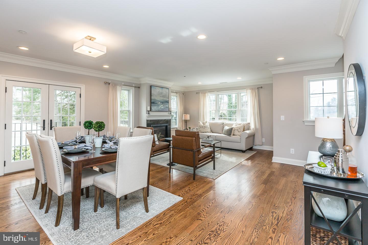 111 West Montgomery Avenue, Unit 107 Ardmore, PA 19003 - Photo 3 of 44 a view of a dining room with furniture window and wooden floor