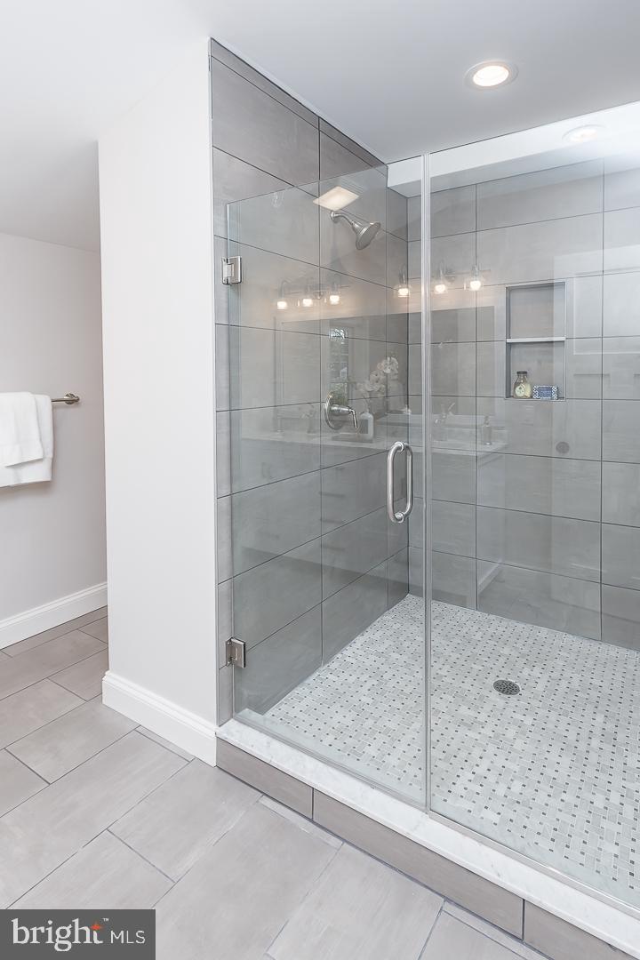 111 West Montgomery Avenue, Unit 107 Ardmore, PA 19003 - Photo 30 of 44 a bathroom with a shower