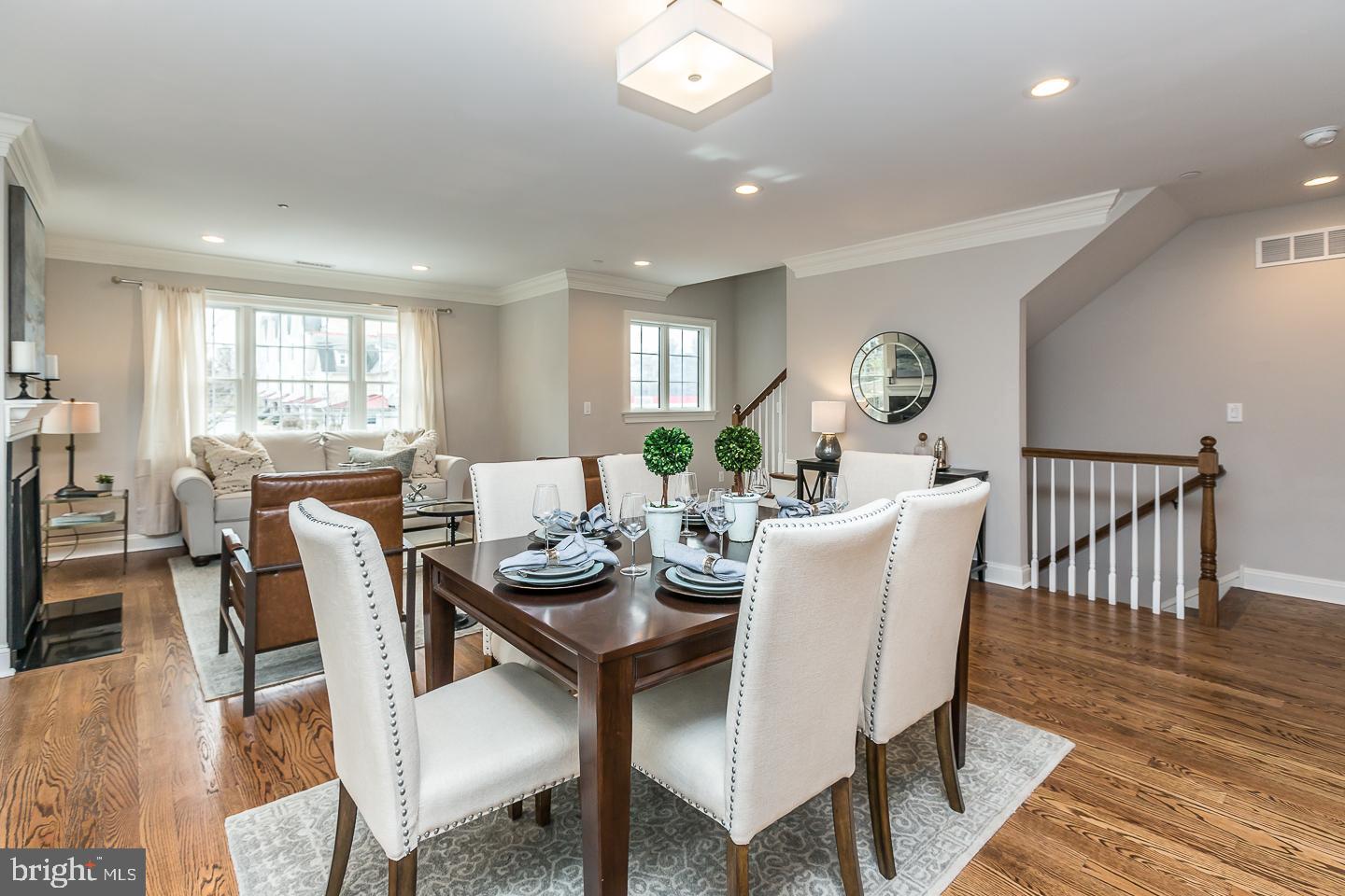 111 West Montgomery Avenue, Unit 107 Ardmore, PA 19003 - Photo 4 of 44 a view of a dining room with furniture window and wooden floor