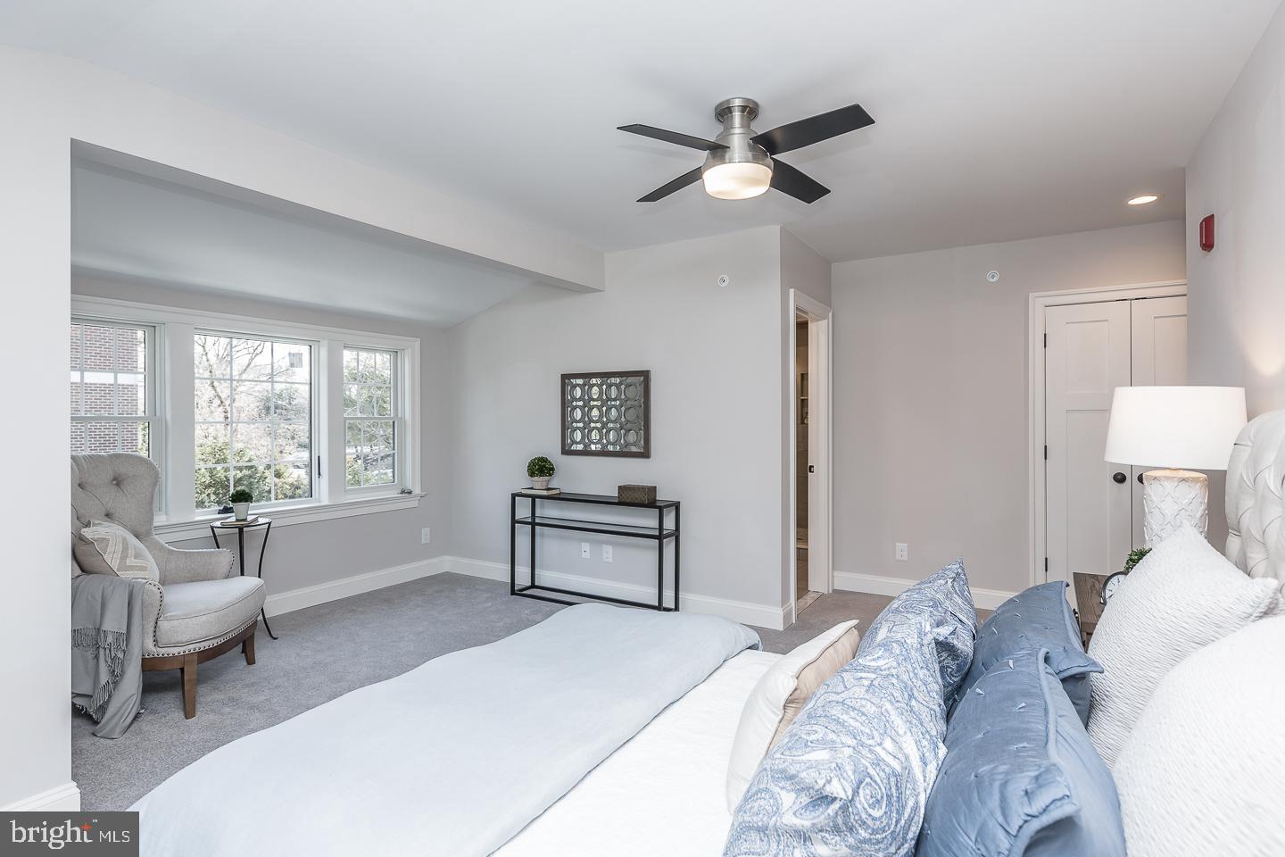 111 West Montgomery Avenue, Unit 107 Ardmore, PA 19003 - Photo 39 of 44 a bedroom with a bed and a window