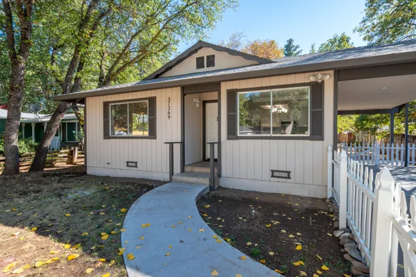 a front view of a house with a porch
