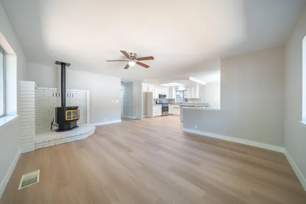 a view of a kitchen with furniture and a kitchen