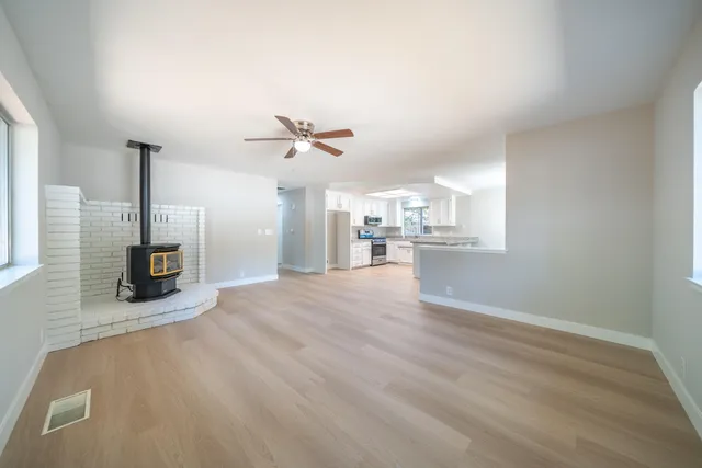 a view of a kitchen with furniture and a kitchen