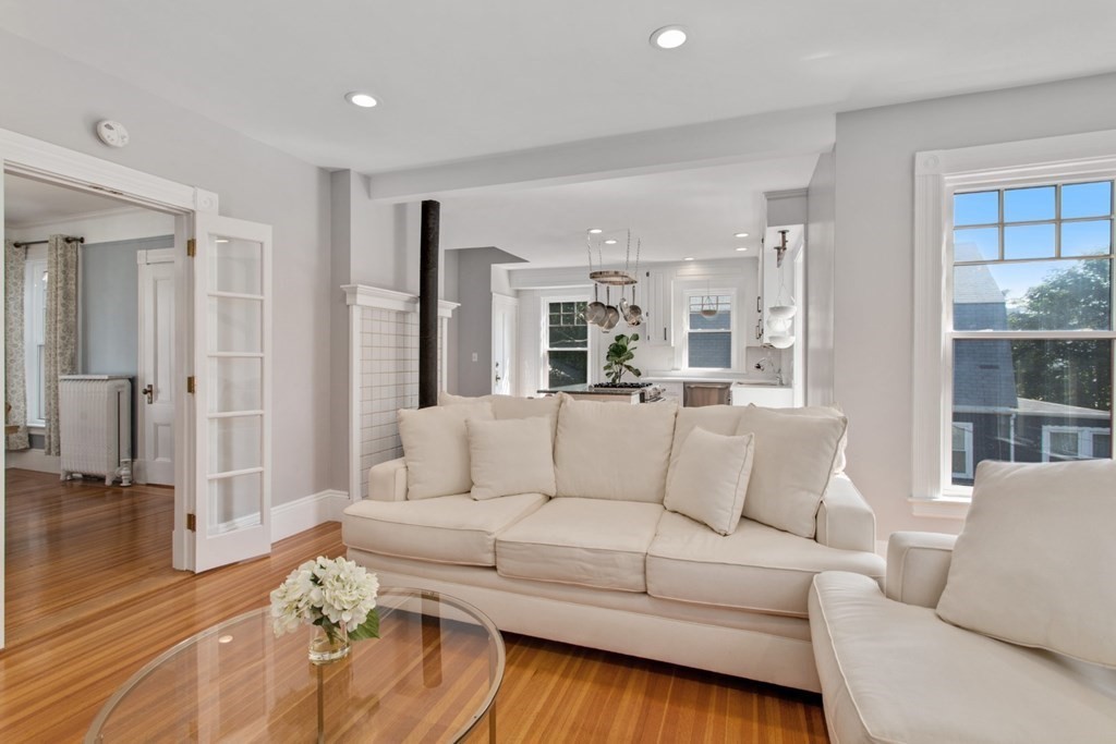 28 Wave Street, Unit 2 Lynn, MA 01902 - Photo 12 of 36 a living room with furniture and a large window