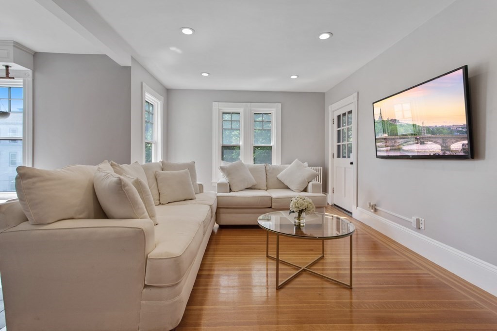 28 Wave Street, Unit 2 Lynn, MA 01902 - Photo 13 of 36 a living room with furniture and a window
