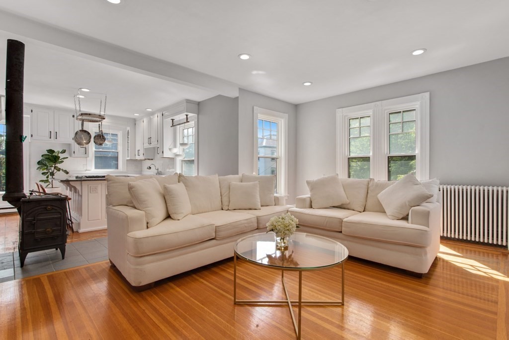 28 Wave Street, Unit 2 Lynn, MA 01902 - Photo 14 of 36 a living room with furniture and wooden floor