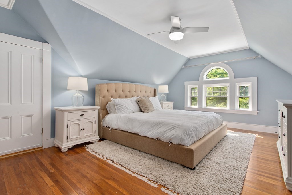28 Wave Street, Unit 2 Lynn, MA 01902 - Photo 21 of 36 a spacious bedroom with a bed and a window