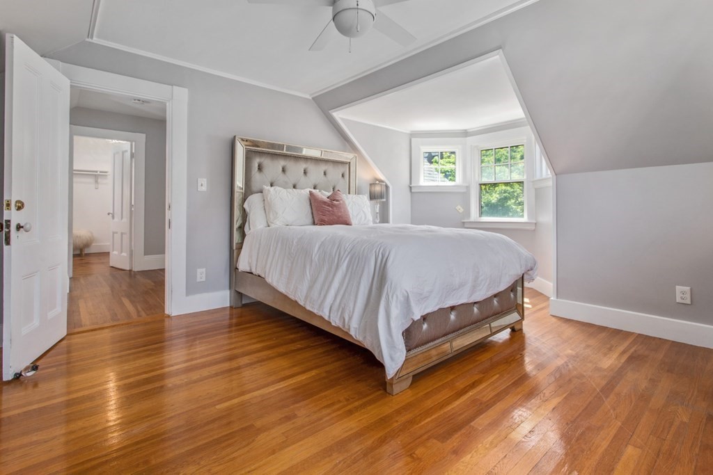 28 Wave Street, Unit 2 Lynn, MA 01902 - Photo 23 of 36 a bedroom with a bed and window