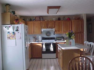 849 Paper Mill Road Lancaster, KY 40444 - Photo 17 of 19 kitchen with oak cabinets & island