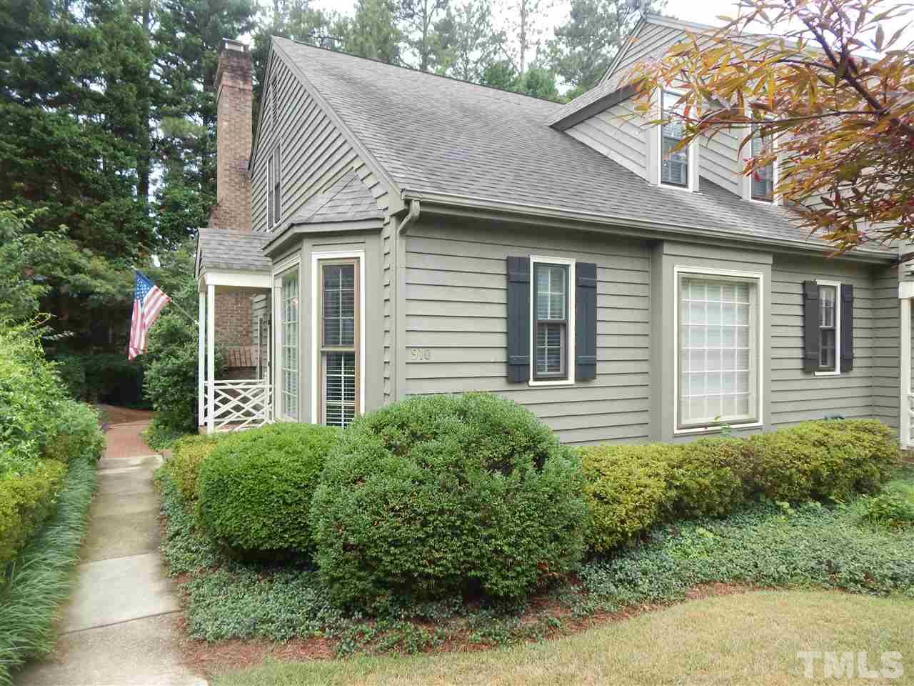 910 Albany Court Raleigh, NC 27615 - Photo 1 of 14 a view of a white house next to a yard