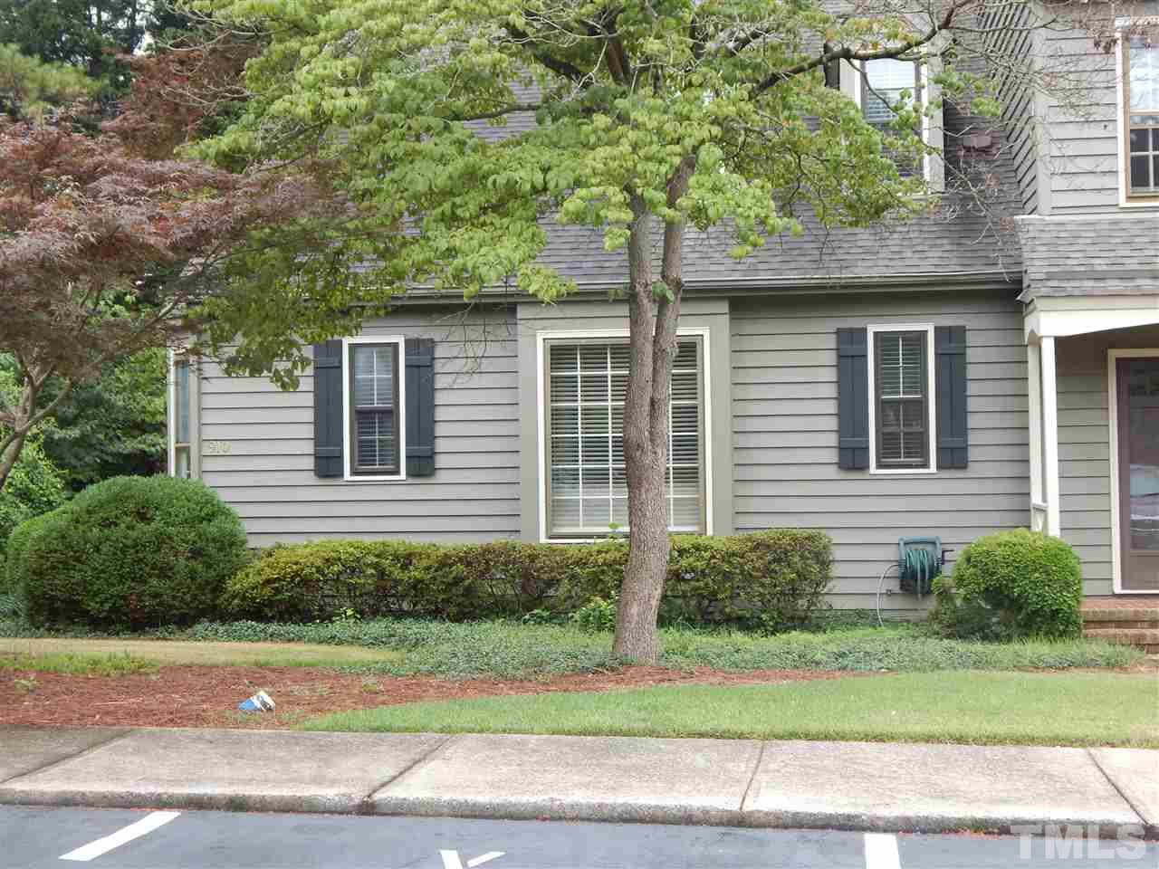 910 Albany Court Raleigh, NC 27615 - Photo 2 of 14 a front view of a house with a yard