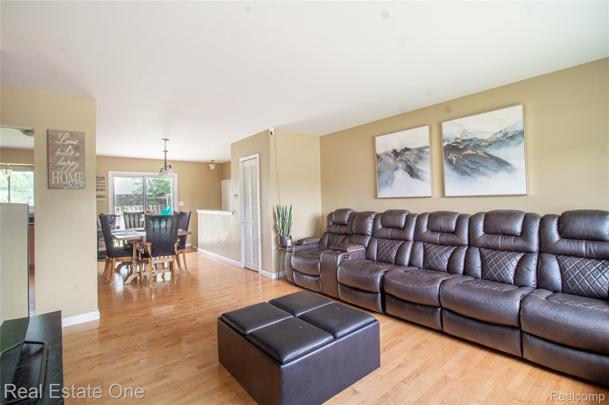 44220 Saltz Road Canton, MI 48187 - Photo 4 of 31 Expansive living area featuring light wood-finish flooring